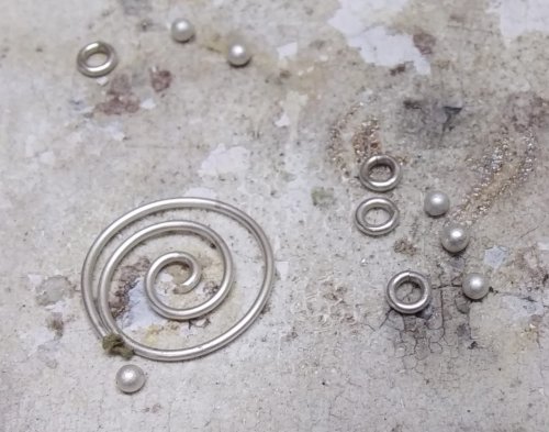 Judy Larson's Bali Style Earrings - , Contemporary Wire Jewelry, Stamping, Stamps, Butane Torch, Soldering, Solder, Drilling, Drill, Apply medium paste solder where the wire end